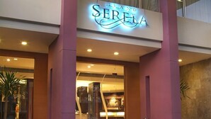 A hotel entrance with a prominent sign reading "SEREIA". - Serela Riau Hotel Bandung (Bandung)