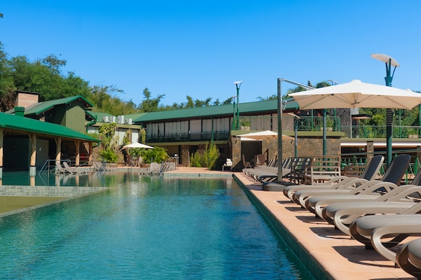 Outdoor pool, pool umbrellas, sun loungers