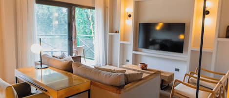 Deluxe Suite | Living area | Smart TV