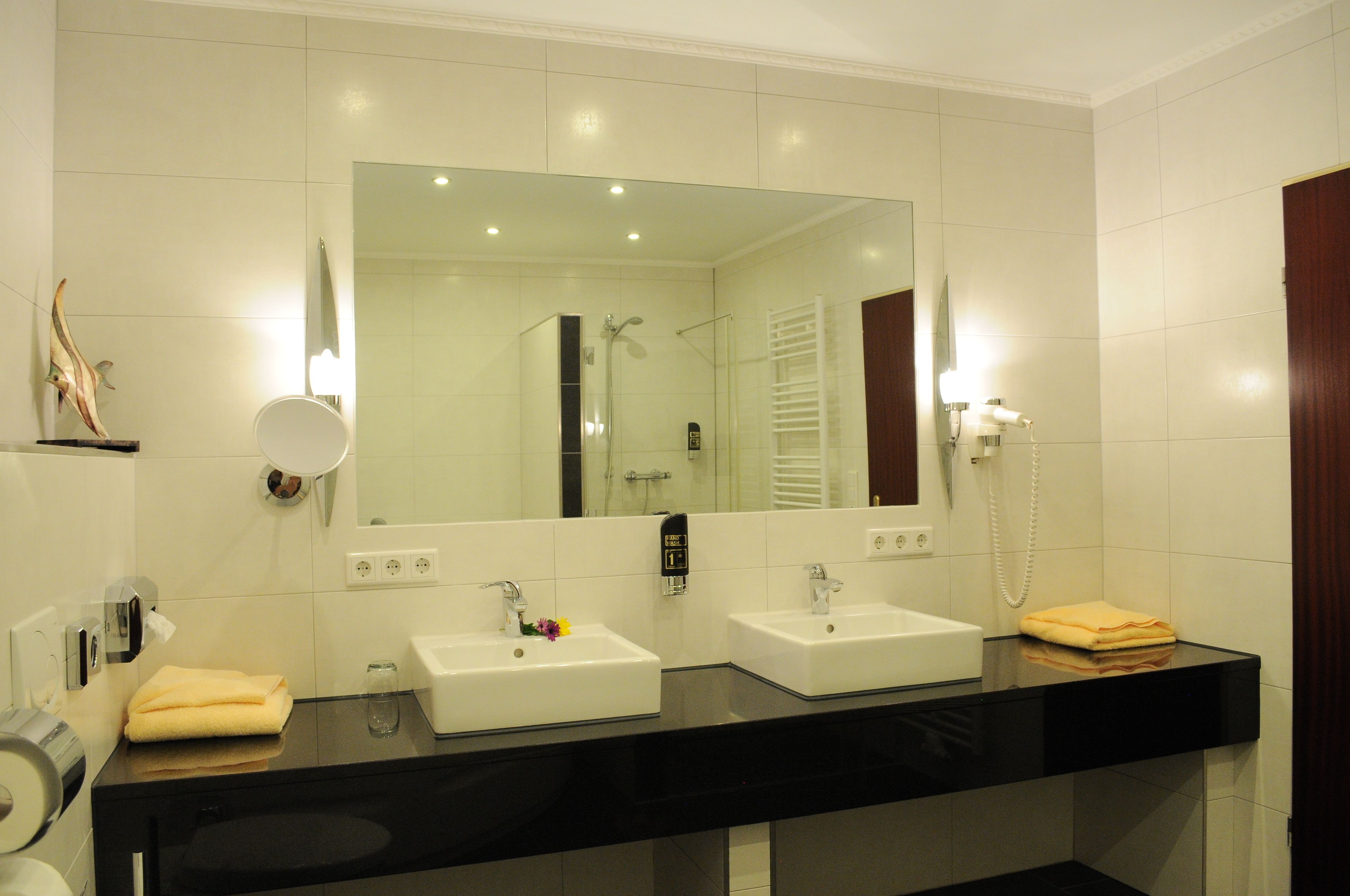 standard double room, 1 king bed | bathroom | shower, hair dryer, towels