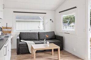 Cottage, 1 Bedroom (Excluding Towels, Sheets, Cleaning) | Living area | 24-cm TV with cable channels - First Camp Malmö (Malmö)
