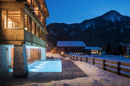 Outdoor pool. Mareo Dolomites Hotel