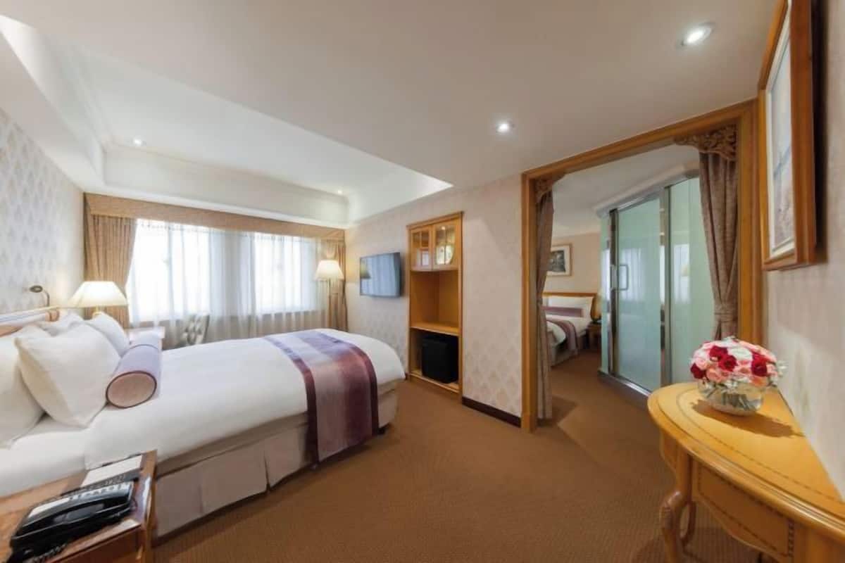 Down duvets, pillow-top beds, in-room safe, desk