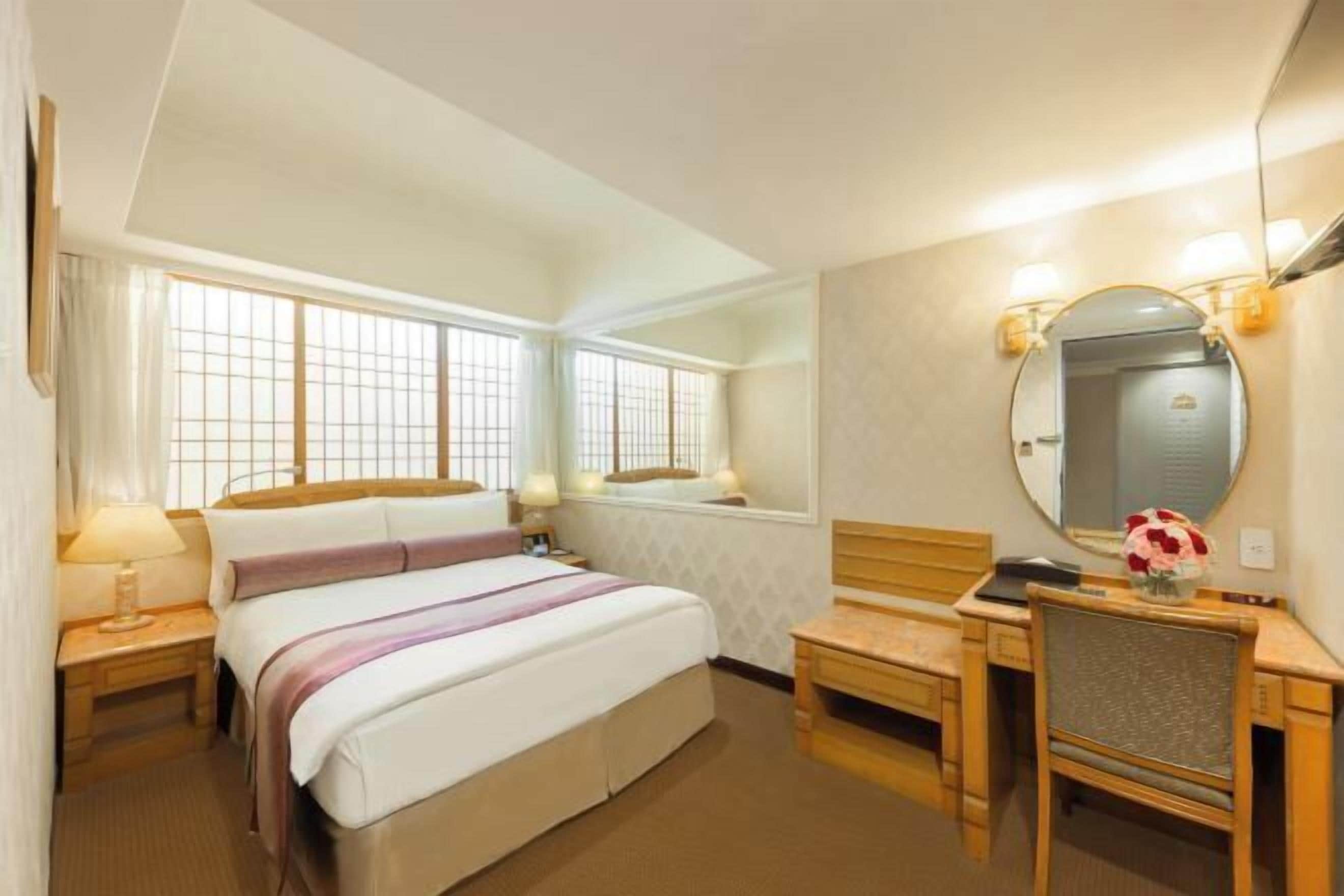 Down duvets, pillow-top beds, in-room safe, desk