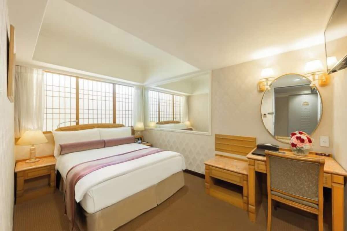 Down duvets, pillow-top beds, in-room safe, desk