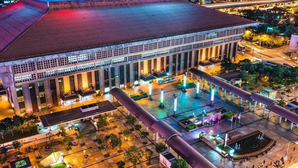 A large, modern building with a prominent central dome and multiple columns. - Cosmos Hotel Taipei (Taipei)