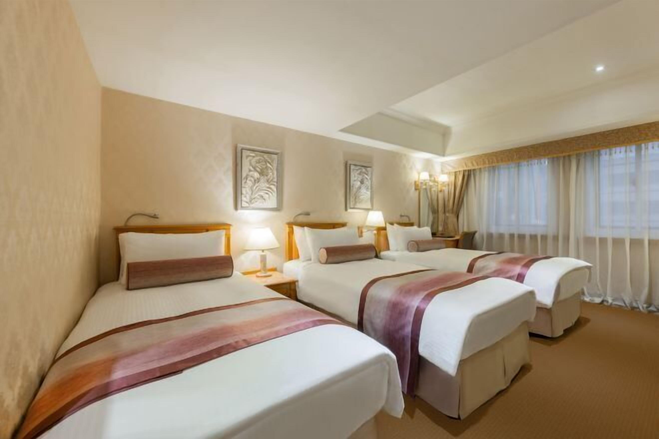 Down duvets, pillow-top beds, in-room safe, desk