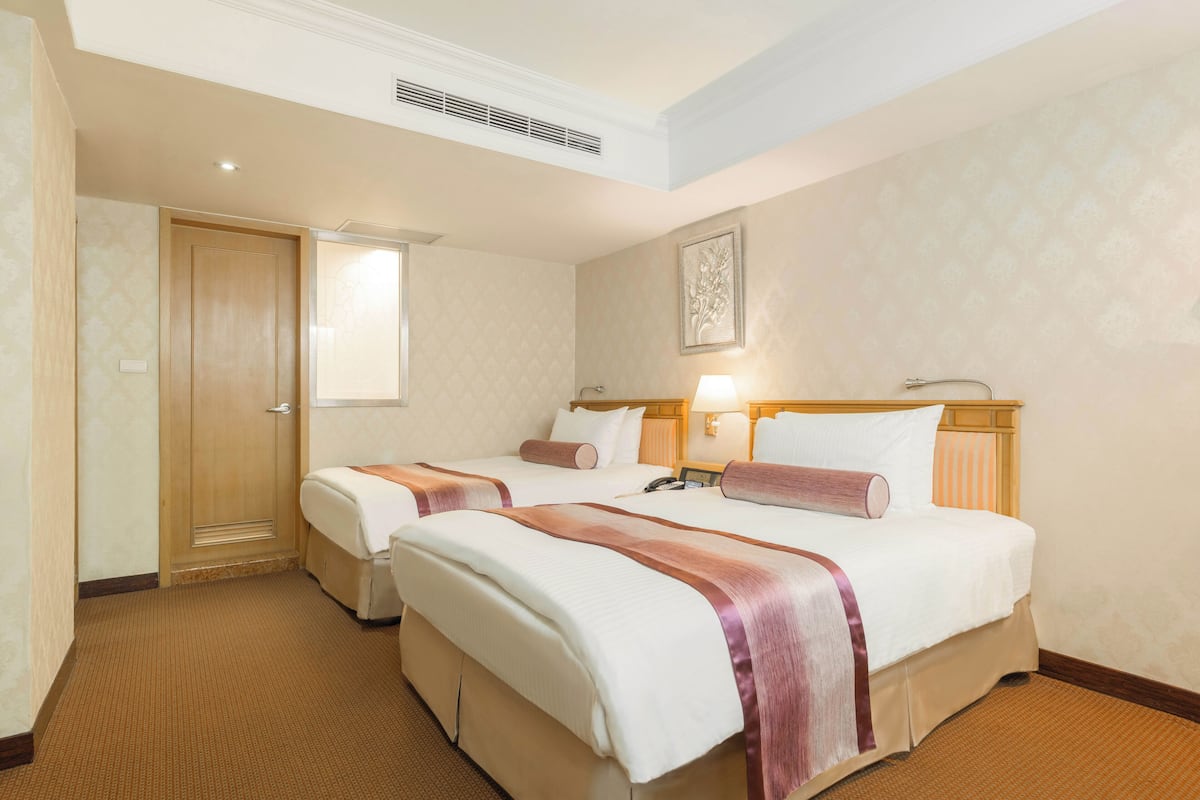 Down duvets, pillow-top beds, in-room safe, desk