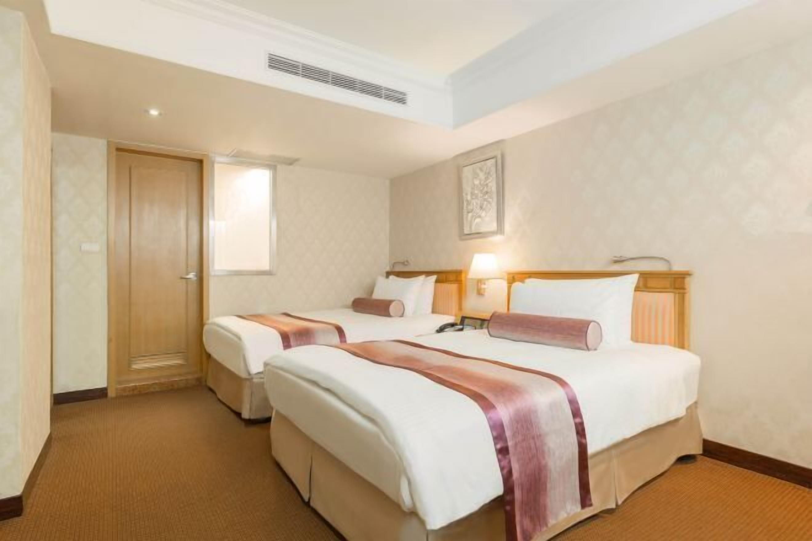 Down duvets, pillow-top beds, in-room safe, desk