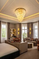 Junior Suite, 1 King Bed (Royal) | Living area | 32-inch flat-screen TV with cable channels, TV