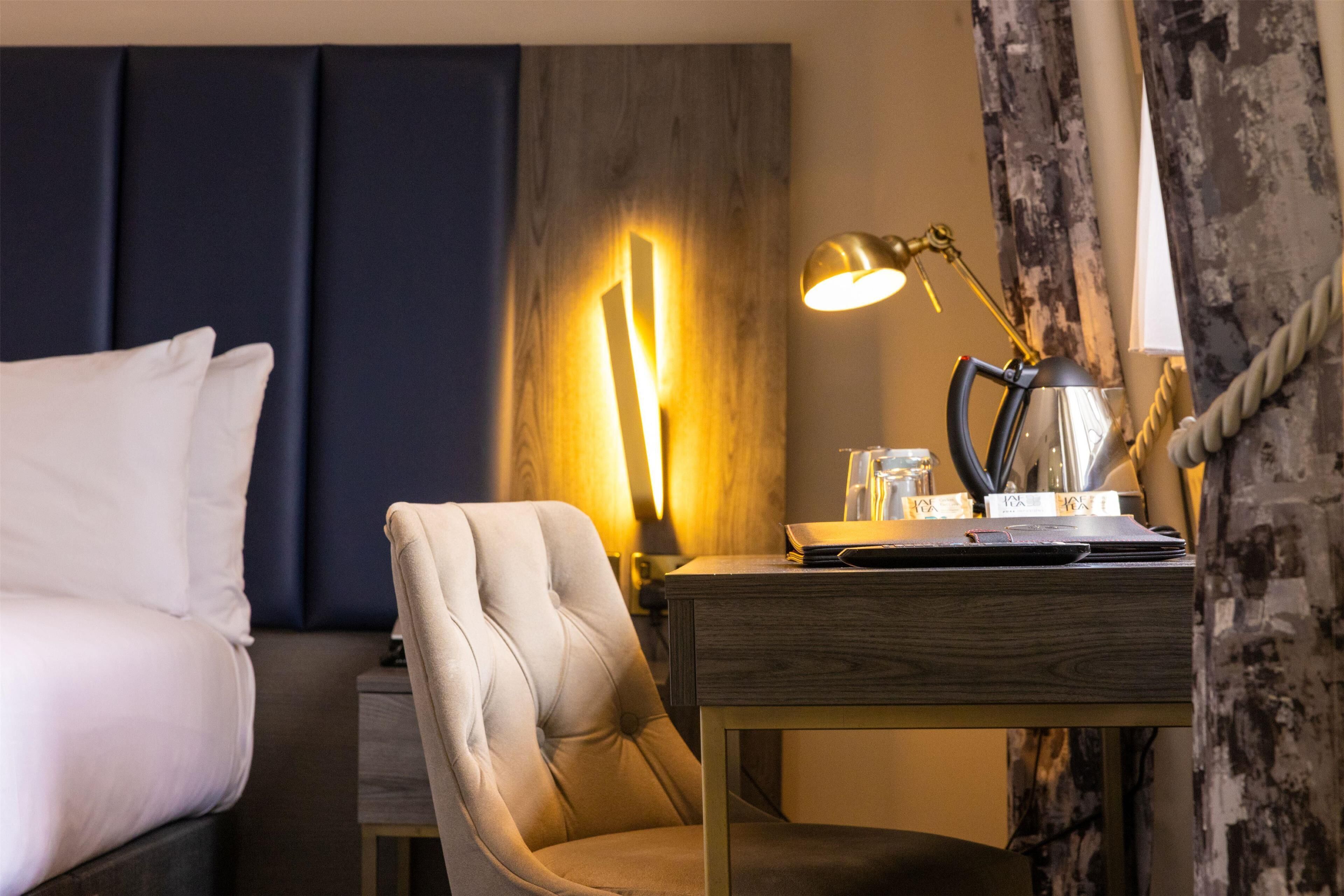 Premium bedding, memory-foam beds, in-room safe, individually decorated