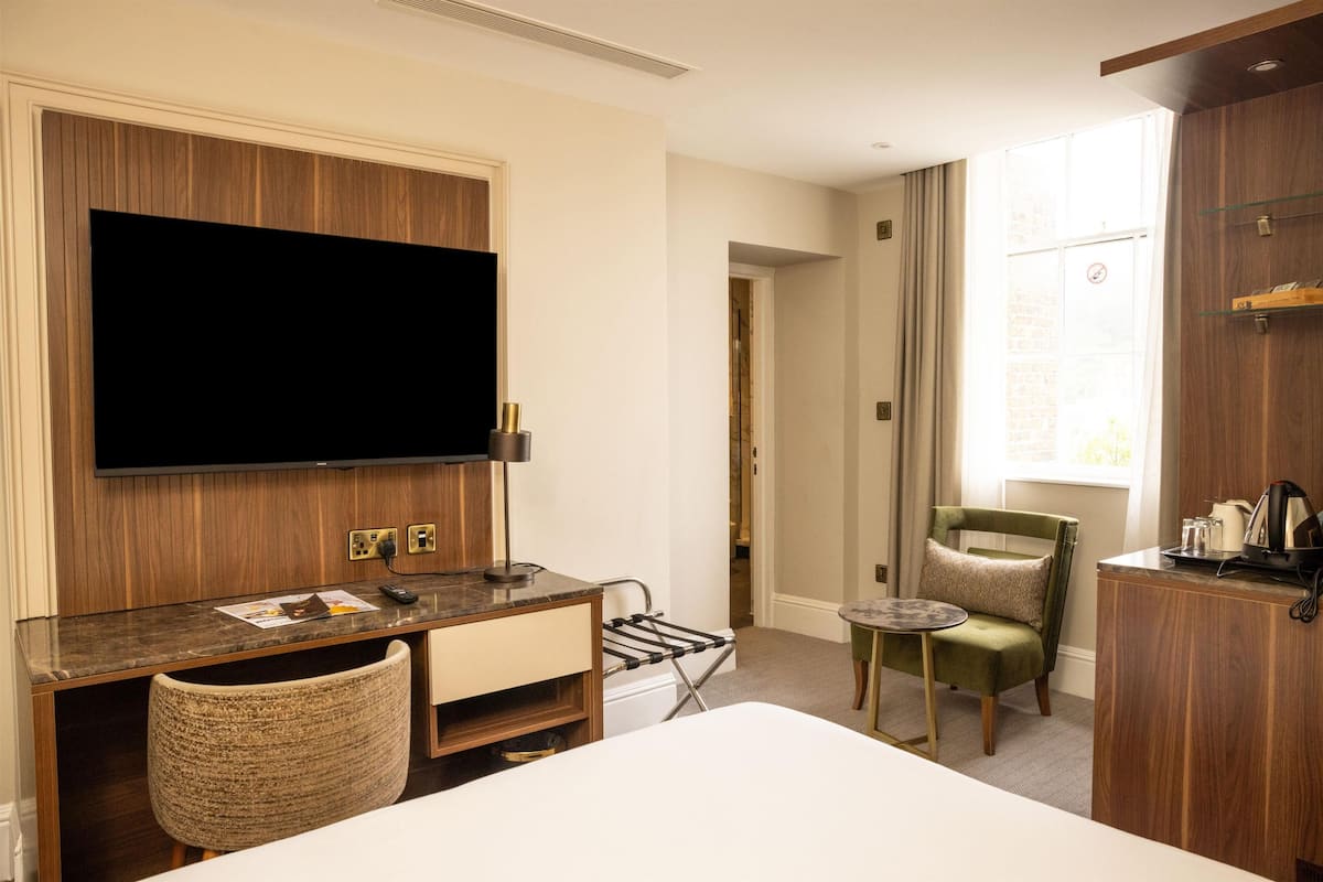 Premium bedding, memory-foam beds, in-room safe, individually decorated