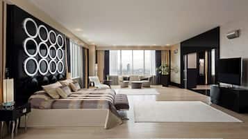 Suite presidencial | Ropa de cama de alta calidad y minibar