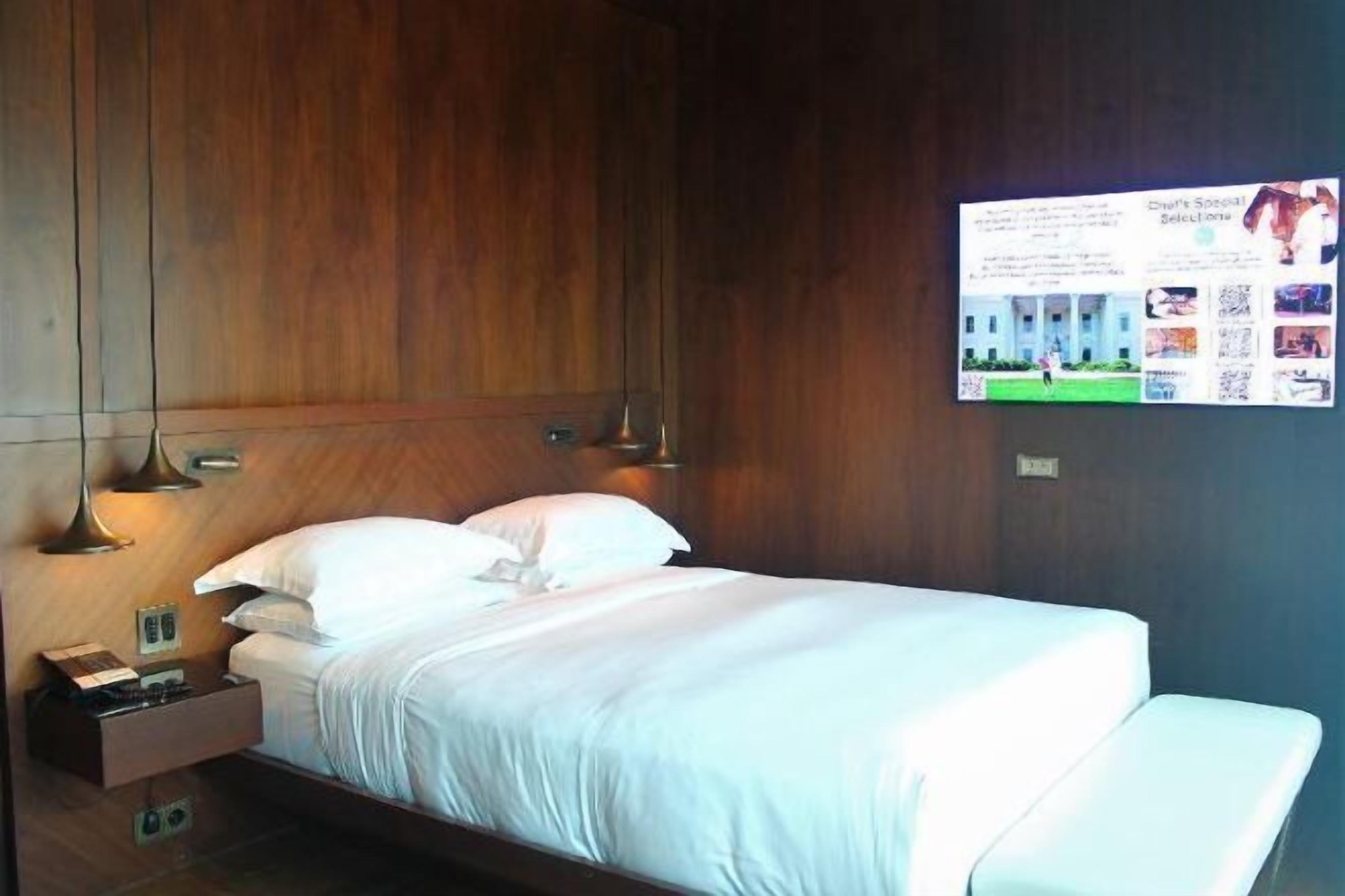 Ropa de cama de alta calidad y minibar 