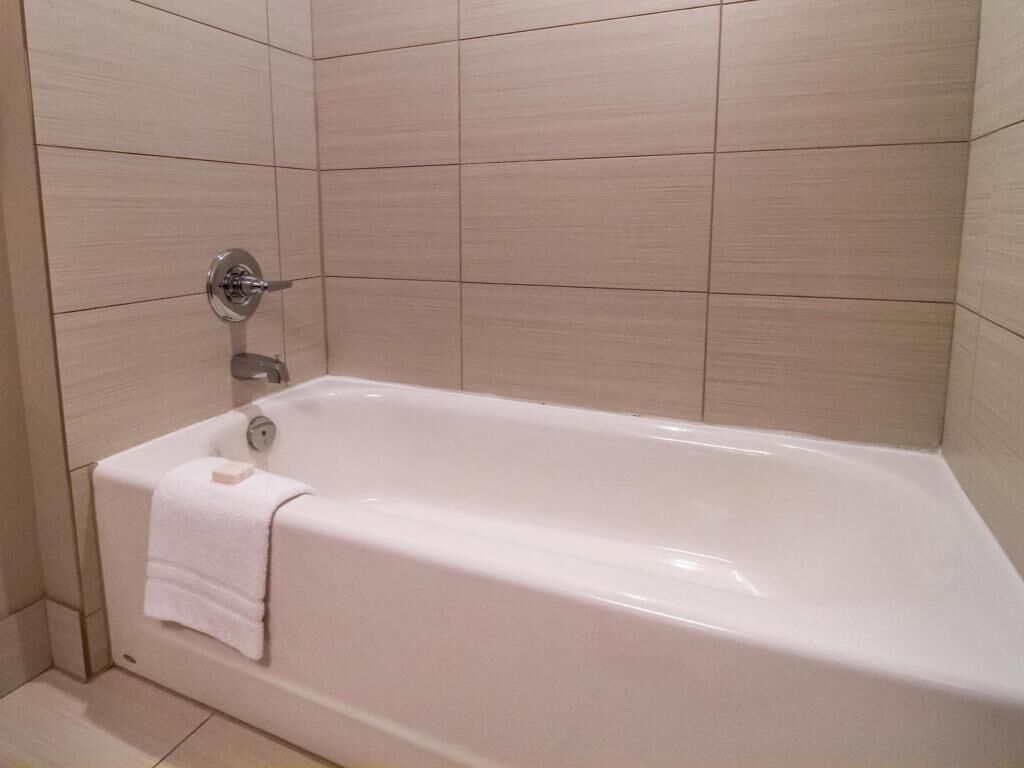 Bathroom | Shower, rainfall showerhead, designer toiletries, hair dryer