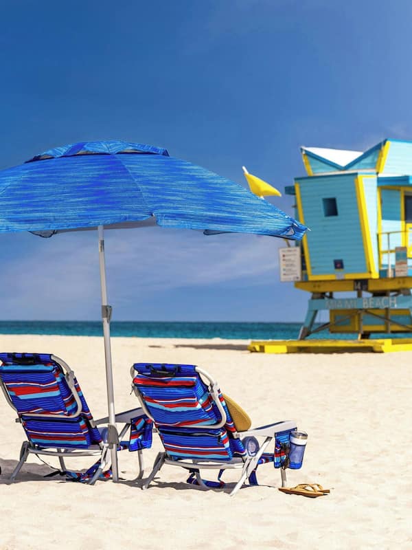 On the beach, sun loungers, beach umbrellas, beach towels