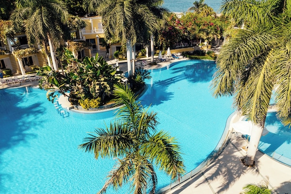 Indoor pool, outdoor pool, pool umbrellas, sun loungers
