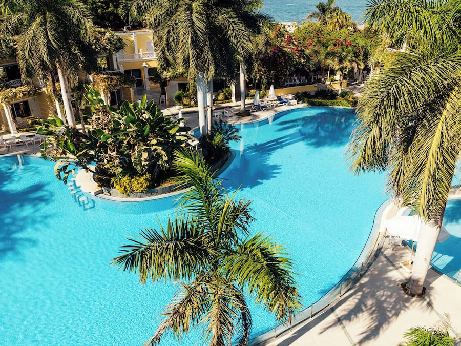 Indoor pool, outdoor pool, pool umbrellas, sun loungers