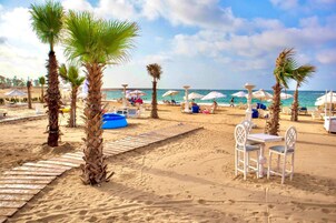 Private beach, beach cabanas, sun loungers, beach umbrellas