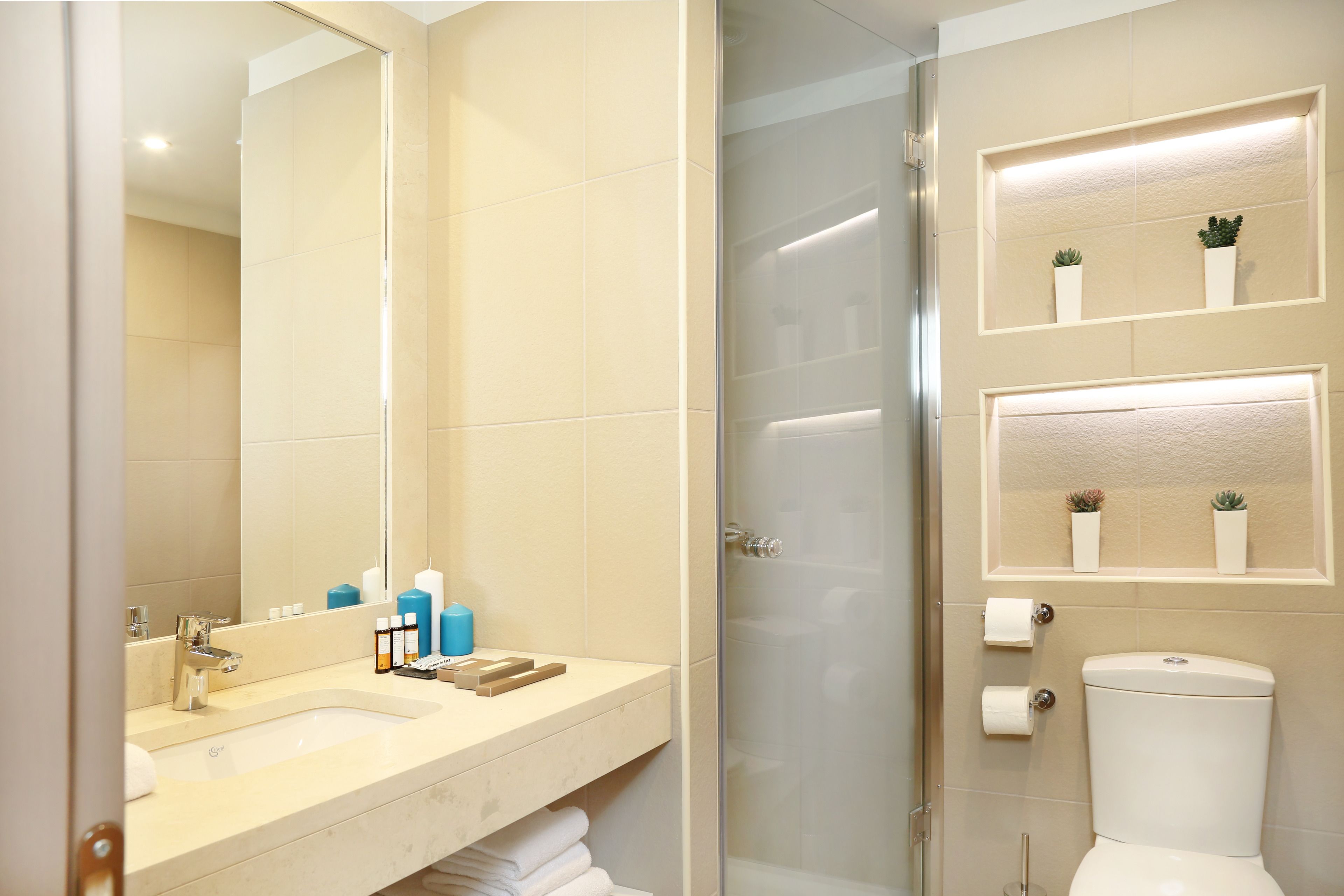 shower, eco-friendly toiletries, hair dryer, towels