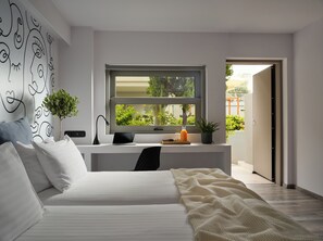 Chambre Confort, 1 chambre, patio, rez-de-chaussée | Literie de qualité, couette en duvet, articles de minibar gratuits