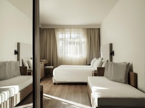 Premium bedding, down duvets, free minibar, in-room safe
