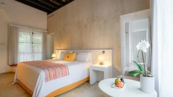 Premium bedding, down duvets, free minibar items, in-room safe