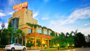 A building with a 'CityPark' sign, large windows, and a well-lit entrance. - Hotel City Park Airport (New Delhi)