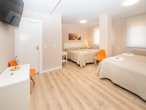 Quadruple Room, Private Bathroom | 1 bedroom, down comforters, free WiFi, bed sheets