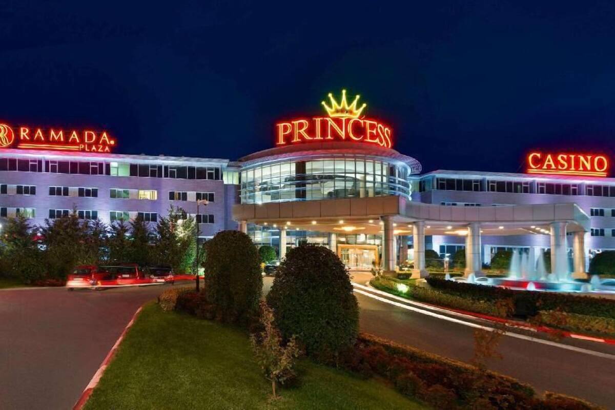 A hotel with a prominent 'PRINCESS' sign, 'RAMADA PLAZA' on the left, and 'CASINO' on the right.