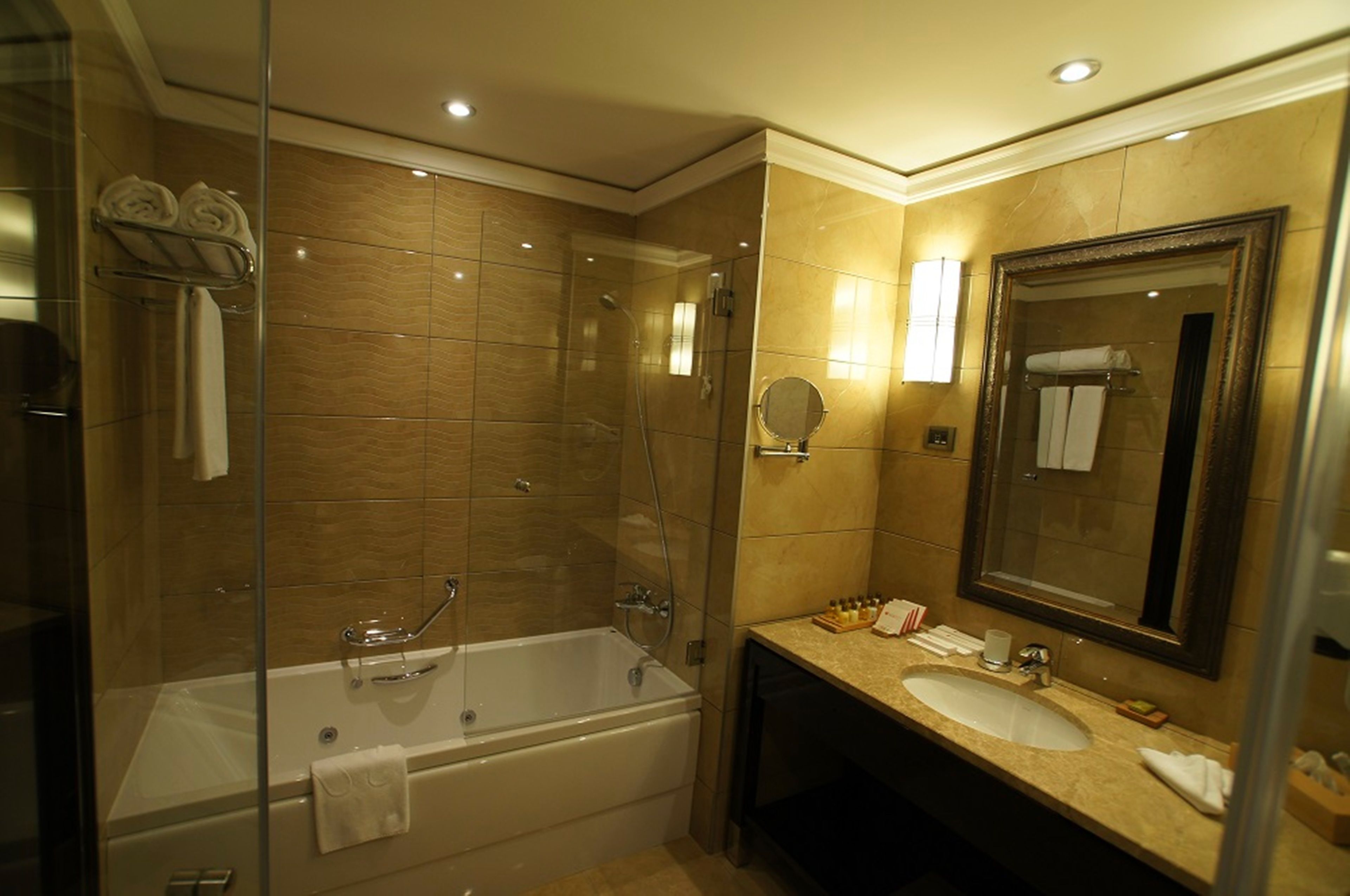 separate bathtub and shower, deep-soaking bathtub, rainfall showerhead