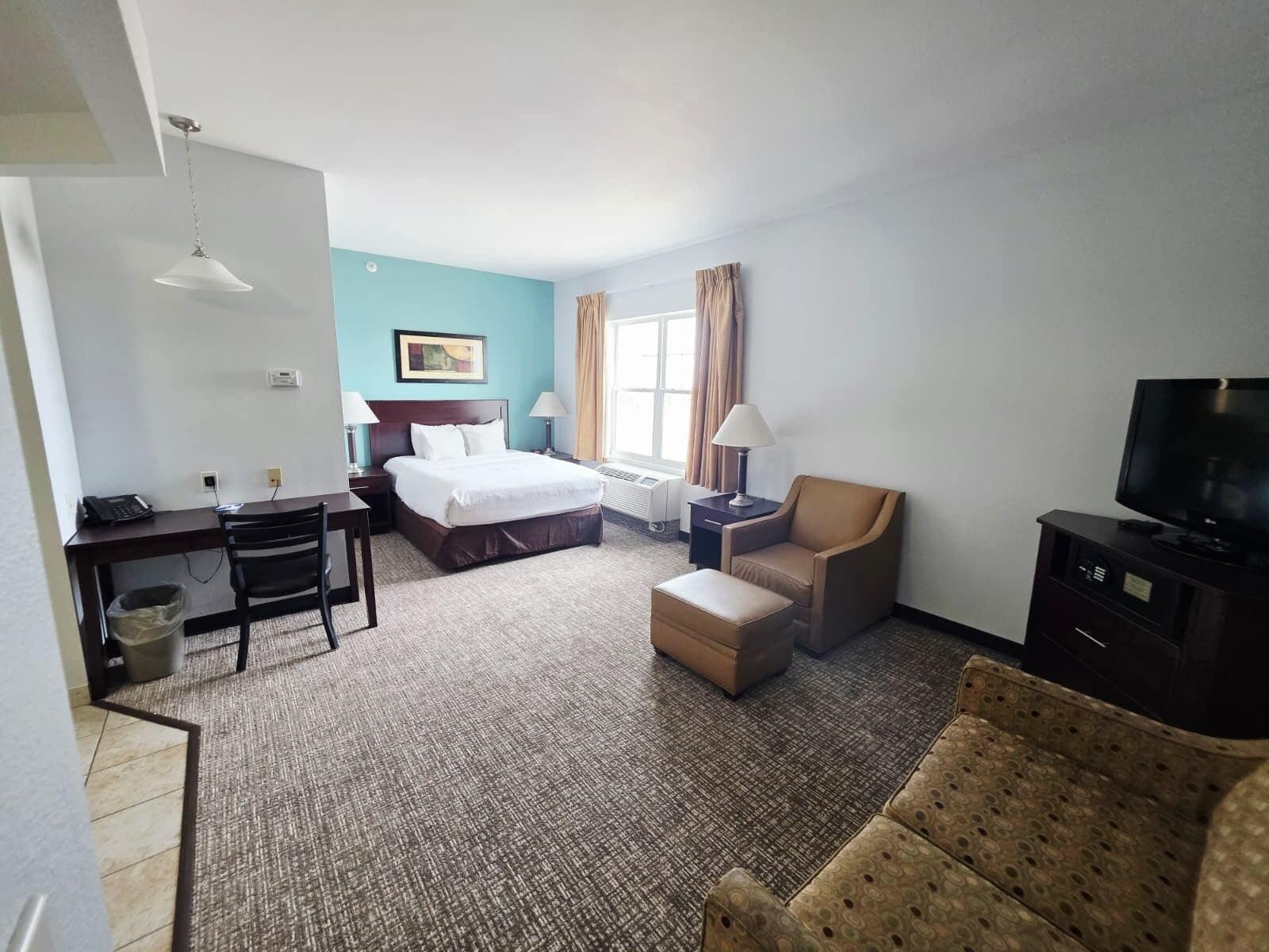 Suite, 1 Queen Bed with Sofa bed, Non Smoking (Efficiency) | Pillowtop beds, in-room safe, desk, laptop workspace