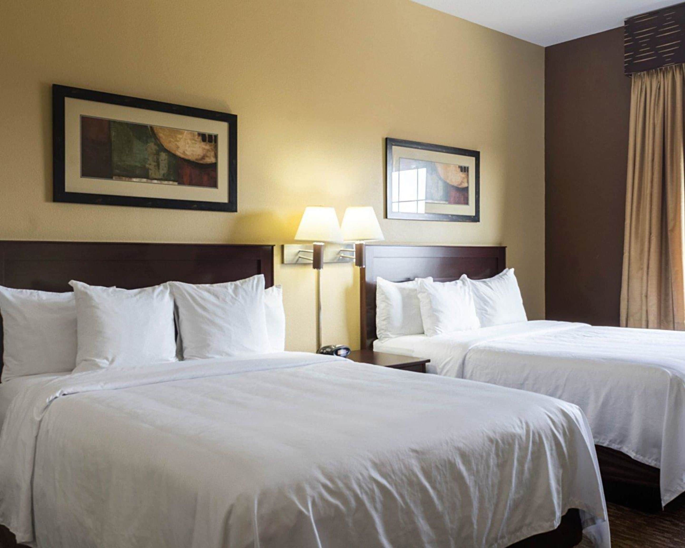 suite, 2 queen beds, non smoking | pillow-top beds, in-room safe, desk, laptop workspace