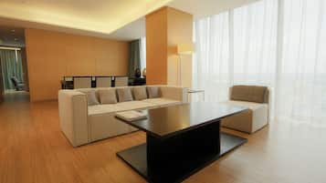 Suite, 1 King Bed, Balcony | Living area | 40-inch flat-screen TV with cable channels, TV