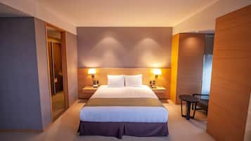 Suite, 1 King Bed | 1 bedroom, premium bedding, down comforters, in-room safe