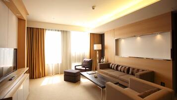 Suite, 1 King Bed (Living Area) | 1 bedroom, premium bedding, down comforters, in-room safe