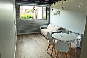 Deluxe Apartment | Living area - Hosteria Kau Si Aike (El Chalten)