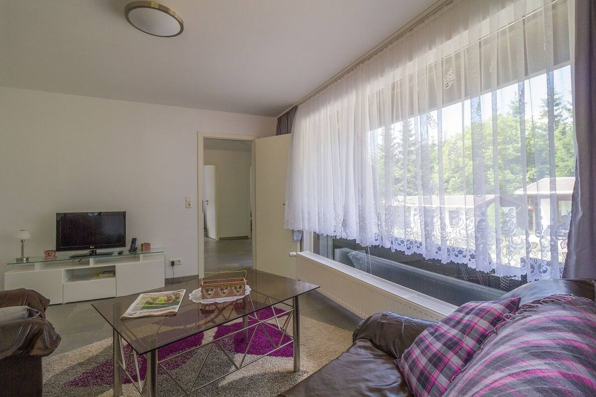 Two Bedroom Bungalow for 3 people | Living room | Flat-screen TV, toys