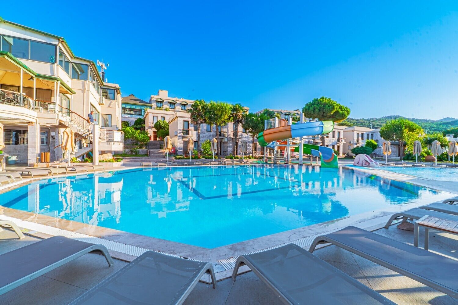 Indoor pool, outdoor pool, pool umbrellas
