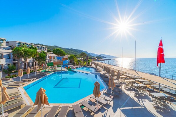 Indoor pool, outdoor pool, pool umbrellas
