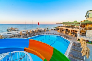 Indoor pool, outdoor pool, pool umbrellas