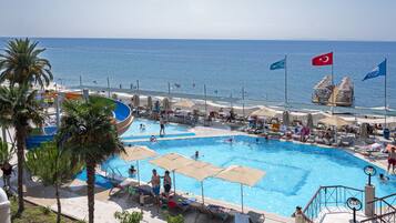 Indoor pool, outdoor pool, pool umbrellas