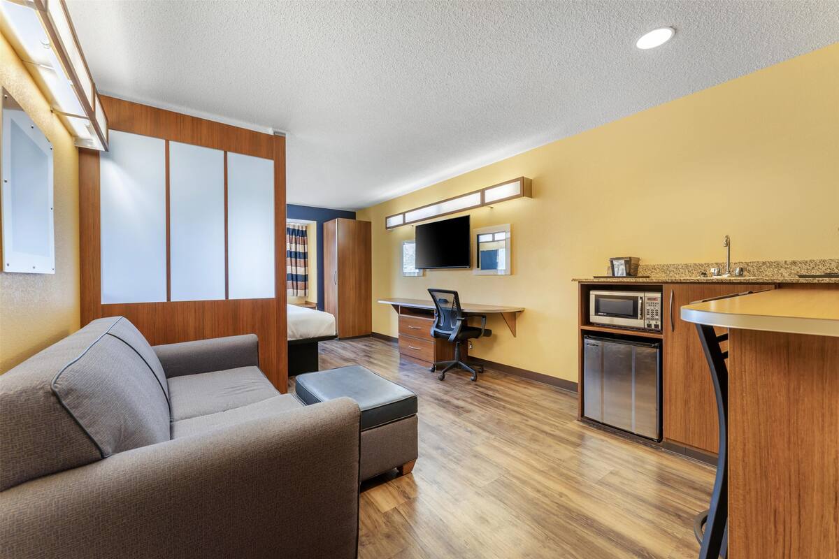 suite, 1 king bed, non smoking, refrigerator & microwave (with single sofabed;larger room) | hypo-allergenic bedding, pillow-top beds, desk, laptop workspace