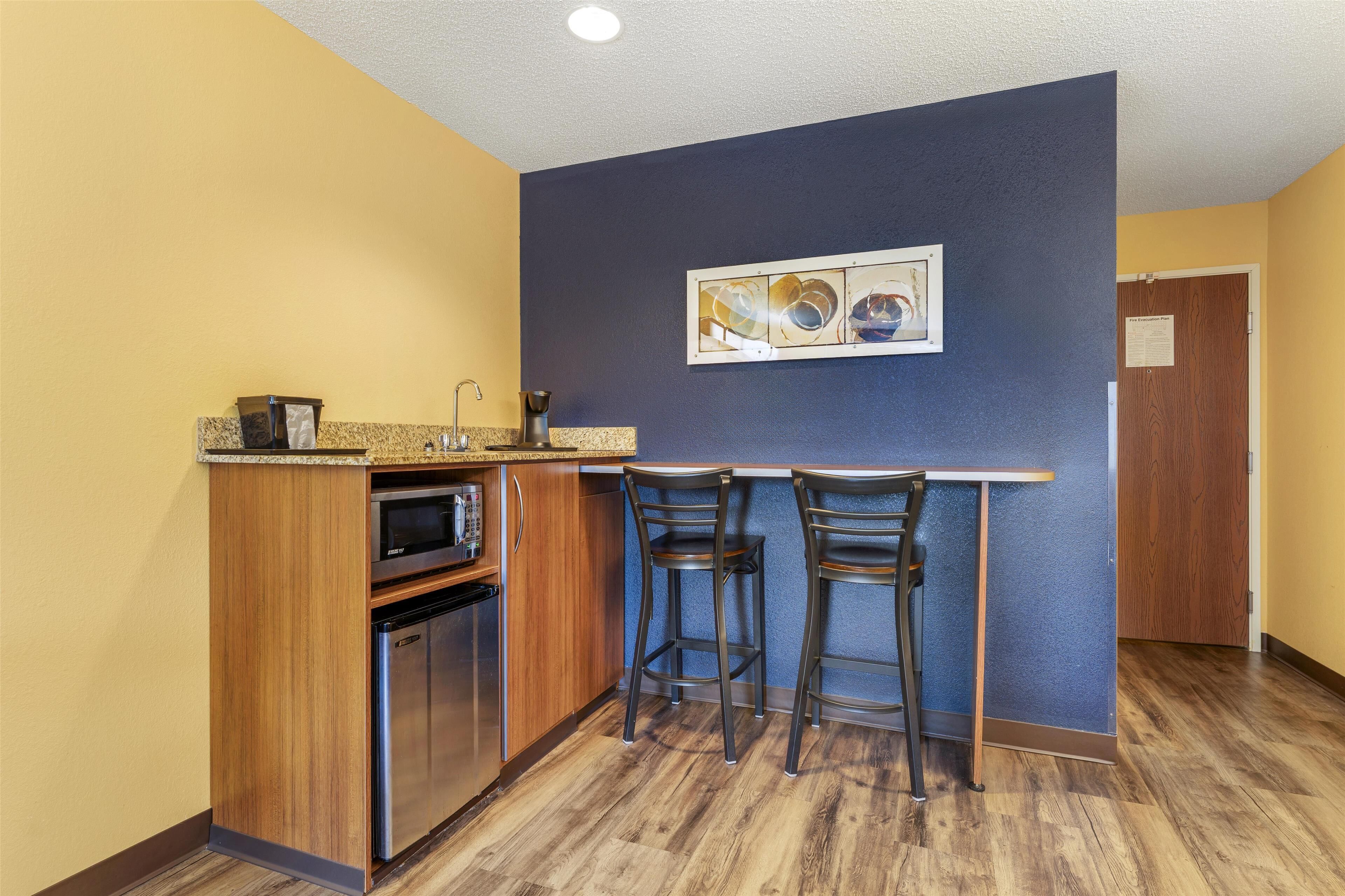 suite, 1 king bed, non smoking, refrigerator & microwave (with single sofabed;larger room) | hypo-allergenic bedding, pillow-top beds, desk, laptop workspace