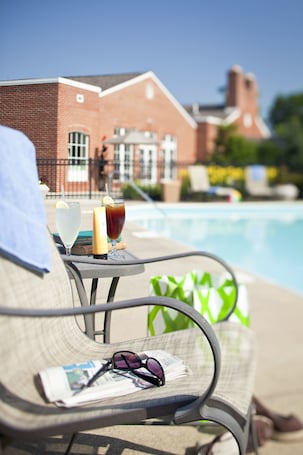 Indoor pool, seasonal outdoor pool, pool loungers. The Ohioan Hotel & Event Center