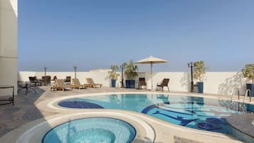 Outdoor pool, pool umbrellas, pool loungers