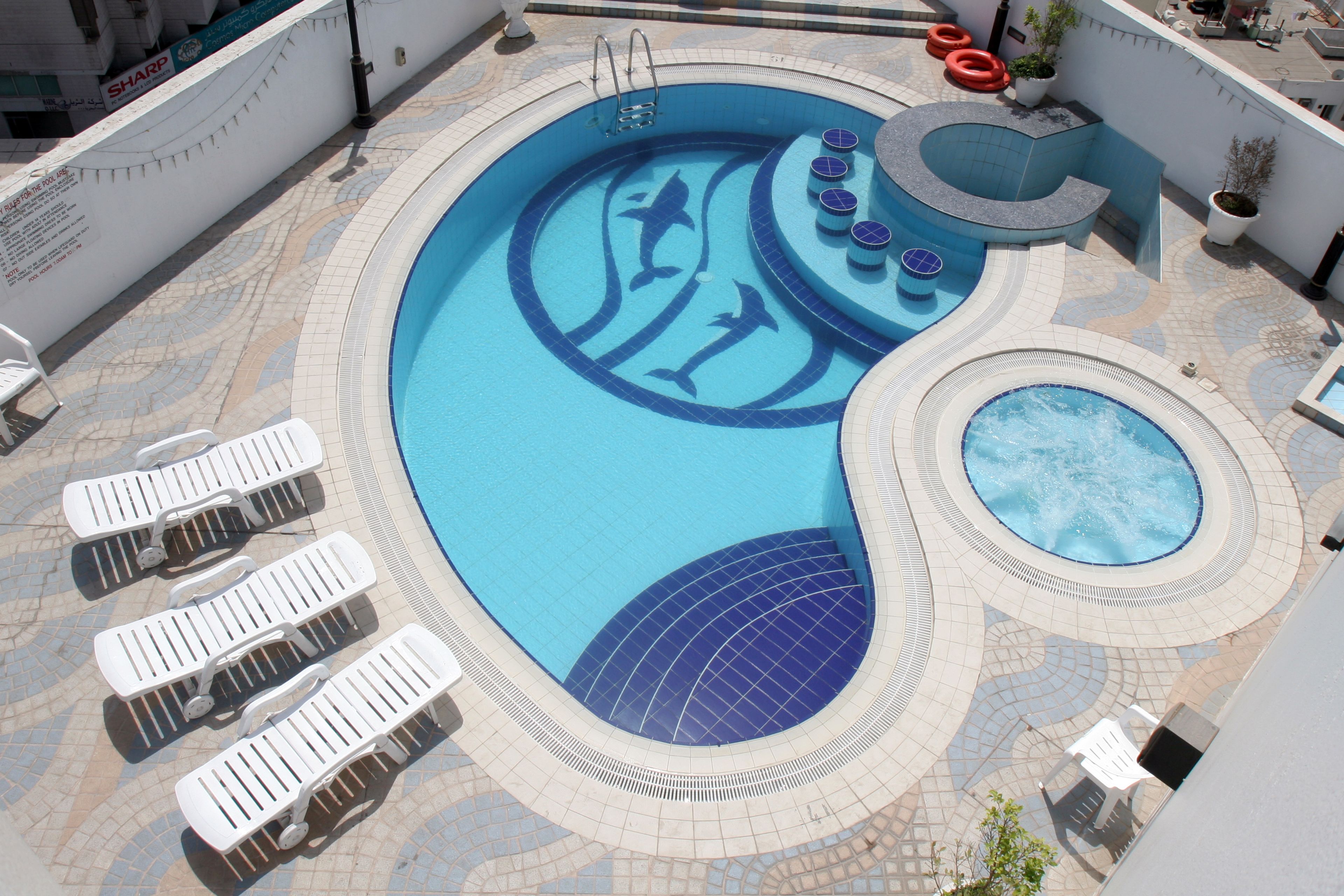 Outdoor pool, pool umbrellas, pool loungers