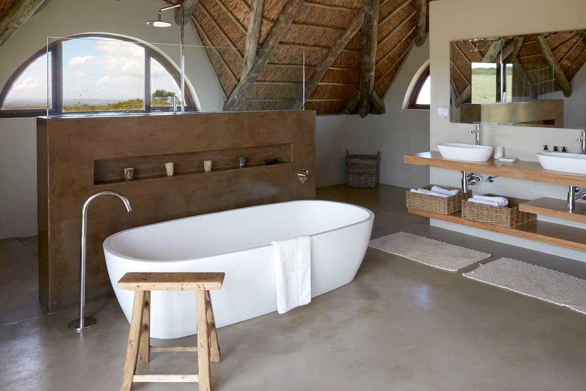 luxury villa (ulubisi) | bathroom | separate bathtub and shower, deep-soaking bathtub, rainfall showerhead