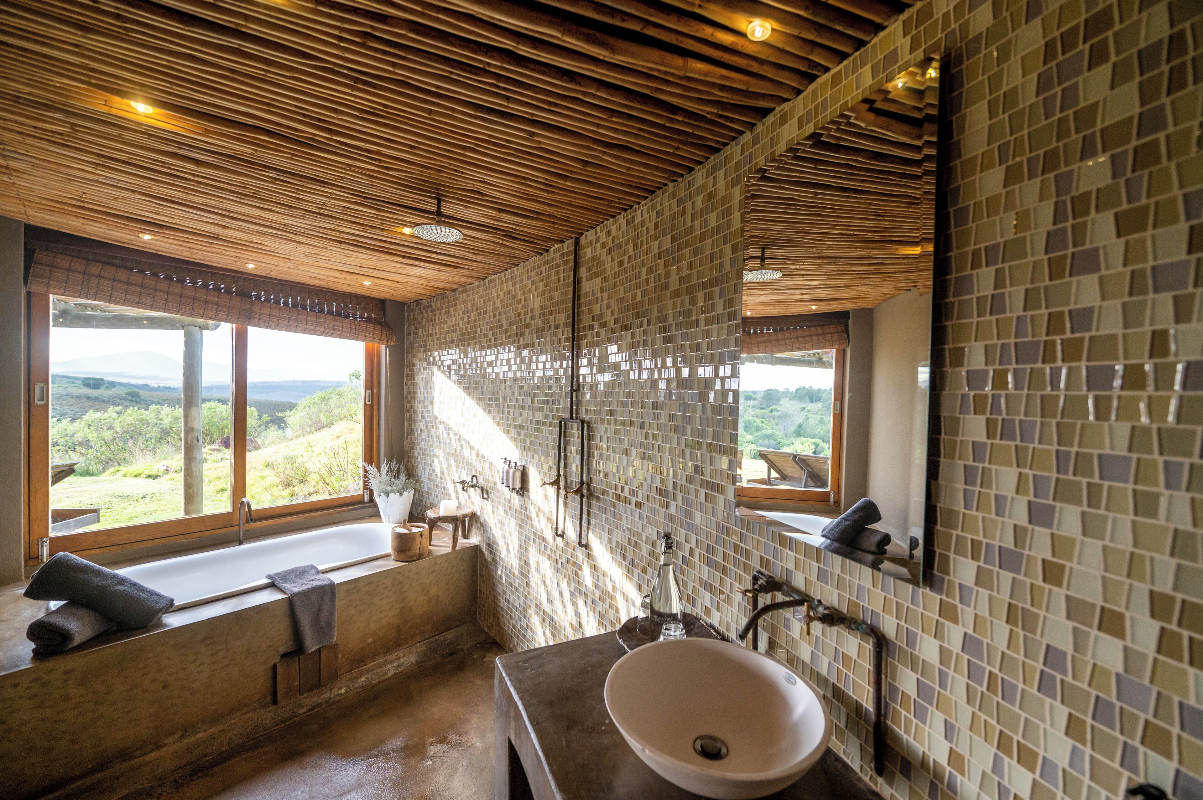 kwena lodge suite | bathroom | separate bathtub and shower, deep-soaking bathtub, rainfall showerhead