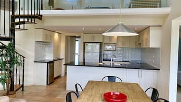 Luxury Apartment, 3 Bedrooms | Private kitchen | Full-size fridge, microwave, stovetop, dishwasher
